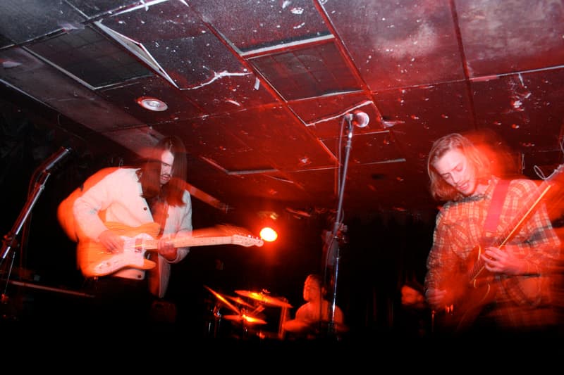 Band playing under the club's low red-lit ceiling